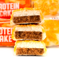 Mountain Joe's Protein Cake Carrot Cake - proteinowe ciastko z kremem waniliowym białą czekoladą i posypką pomarańczową by Mountain Joe's (mountain-joe-s-protein-cake-carrot-cake)