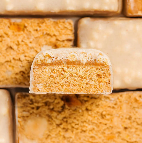 FIZI Mood Booster Salted Caramel - vegan protein bar topped with white chocolate with no added sugar