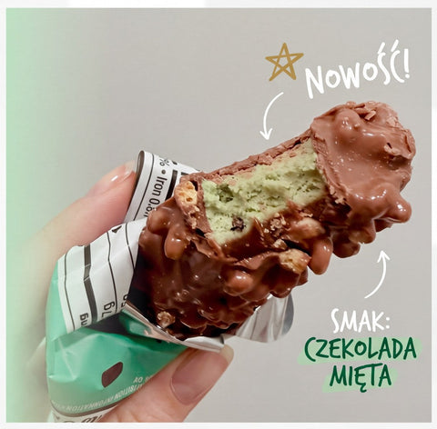 Guiltfree baton proteinowy Barebells Mint Chocolate Crisp z nadgryzionym wnętrzem o miętowym kolorze i polewą