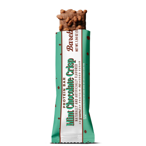 Baton proteinowy Guiltfree Barebells Mint Chocolate Crisp w miętowym opakowaniu z widoczną czekoladową polewą.