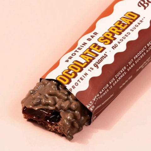 Guiltfree Barebells Protein Bar Chocolate Spread w mlecznej czekoladzie z chrupiącymi kawałkami i kremowym nadzieniem