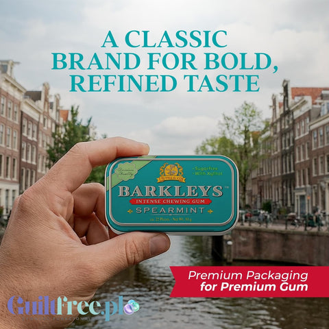 Guiltfree Barkley's spearmint sugar-free chewing gum in a decorative metal tin held against a canal background.