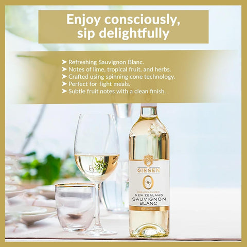 Butelka wina bezalkoholowego Guiltfree Giesen 0% Sauvignon Blanc obok kieliszka na zastawionym stole