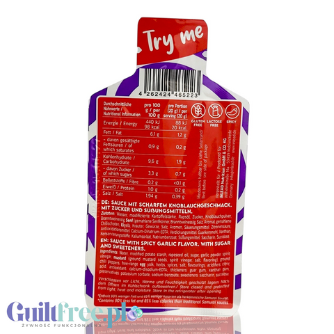 Saszetka Guiltfree Inlead Premium Sauce Spicy Garlic z tabelą wartości odżywczych i składem na odwrocie opakowania