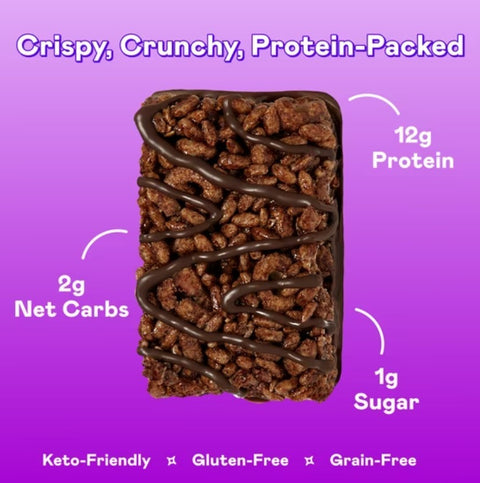 Guiltfree Magic Spoon baton proteinowy Double Chocolate z chrupiącą kakaową bazą i polewą na fioletowym tle