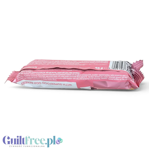 Guiltfree baton proteinowy Purella o smaku truskawkowej bezy w różowym opakowaniu z widocznym składem na odwrocie