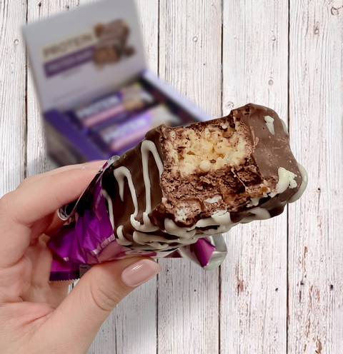 Guiltfree Quest Nutrition Stacks Brownie a la Mode to wielowarstwowy baton proteinowy w czekoladzie z nadzieniem