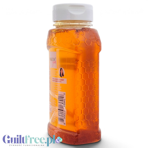Guiltfree Wholesome Yum zamiennik miodu bez cukru z cynamonem w plastikowej butelce o strukturze plastra miodu